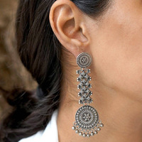 This is a beautiful pair of zircon stud earrings. The pack comes with one pair of beautiful studded oxidized earrings. You can choose from any of the two options provided. This pair will work with any Indian or western outfit. Buy this for yourself or get it as a gift for your loved ones. Besides, you will also get an assured gift on every purchase.