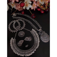 This beauty set of 6 includes long necklace, short necklace, ring, nose pin, bracelet and pair of earrings. Shop this unique antique looking set handcrafted with love by the experienced craftsmen just for you. you can pair the set with ethnic attire as well as casual to have a statement fusion look.Premium quality!!