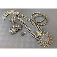 Impressively detailed and elaborate- this long necklace and earrings set with these beautiful and delicate petal motifs studded with stones are versatile enough to justify everyday or occasion dressing. Find your inner gypsy vibe and express with style these statement jewels.Wear together or separately.