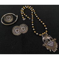 Let your face do the talking with this mesmerizing German Silver oxidised maangtikka set by Vastrabhushan. The maang tikka is inspired by the ancient headdress of South Indian deities. This????Indian jewelry is light in weight, it is the most recent style that has become a must-have piece of????bridal jewelry.Note: If you want this Indian jewelry to last longer, keep it dry and free of chemicals.