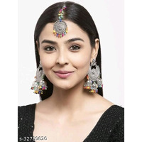 Jazz up your ethnic look with these gungroo earrings. This Ghungroo Silver Oxidised Earrings are handcrafted with oxidized silver and feature an iconic bunch of playful ghungroos that add a lively character to your look. With ghungroos always being a trendsetter, these earrings will surely be a favorite!