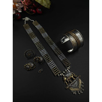 Beautifully ornate with floral motifs , brilliant stones & hanging pearls, this one of a kind necklace set will make you fall in love with it instantly. Handcrafted in german silver with oxidized silver plating , this glorious set has a breathtaking impact of instantly adding glam to your outfits. They look splendid with your sarees , low neck kurtas or even with your lehangas.