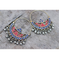 Elephant motif evil eye earrings have been an essential part of traditional Indian jewelry for ages. They have an exquisite air of royalty and lavish taste. An excellent display of German silver Indian jewelry, this pair is a customer favorite. Handcrafted with authentic German silver, this pair needs to be kept away from water or soap.Stop scrolling, and grab this fantastic deal on Vastrabhushan, and get assured gifts on every purchase.