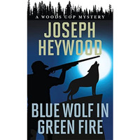 Blue Wolf in Green Fire: A Woods Cop Mystery [Paperback]
