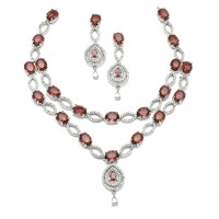 ZENEME Rhodium-Plated American Diamond Studded Abstract Necklace With Earrings Jewellery Set For Girls and Women (Red)