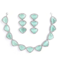 ZENEME Rhodium Plated Silver Toned Triangular Shaped American Diamond Studded Jewellery Set For Women and Girl (Sea Green_Design_01)