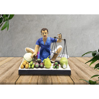 Niharika Collections Krishnanagar Handmade Clay Gift & Decor Sitting Human Figure Miniature Idol (Vegetable Seller-Basic)