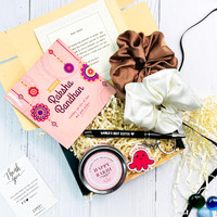SINCE 7 STORE Rakhi Gift Hamper for Sister - Includes 6 products: Metal Pen which says Worlds Best Sister, 2 Scrunchies, Keychain, Scented Jar Candle, and Heartfelt Note from Brother