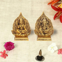 Handicrafts Paradise Antique Gold Plated Metal Lakshmi Ganesh Pair with Leaf Background, 5 inch, 2 Piece