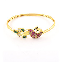 ZAVERI PEARLS Pink & Green Cubic Zirconia Peacock Inspired Bangle Style Brass Kada For Women-ZPFK10390