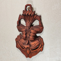 Dreamkraft Metal Face Mask Nazar Battu Evil Eye Protector Wall Mounted Nazar Suraksha Kawach Wall Hanging Evil Eye Hanging For Home & Office Entrance Copper -(16.5 X 3 X 9.5 Cm)