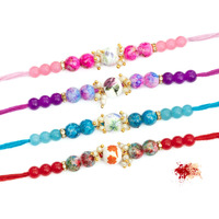 To The Nines Rakhi for Brother with Greeting Card and Tialk Material - Pack of 4 Rakhi