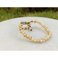 RDK Natural White Gunja/Chirmi Seed Bracelet (40 Beads With 6 Mini Bead) Chirmi Gunja Seeds for Lakshmi Upasana Diwali Pooja Wealth Beads Fang-sue Vastu (White Gunja Bracelet)