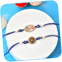 Craftvatika Evil Eye Rakhi Set For Brother Boy Men, Evil Eye Rakhi Set Of 2 For Brother, Rakshabandhan Rakhis, Designer Evil Eye Bracelet, Rakshasutra For Bhaiya Men With Best Wishes Card Tilak Set