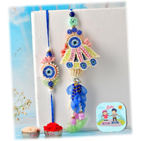 Craftvatika Premium Evil Eye Rakhi Set For Brother Bhabhi | Designer Rakhi Set For Bhaiya Bhabhi Evil Eye Lumba Couple Pair With Fridge Magnet Gift, Rakshabandhan Greeting Card, Tilak Set, Home Decor