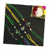 Mahi Set Of 4 Multicolored Religious Rakhis Carrying Krishna Playing Flute, Peacock-Feather-Shaped, Krishna Flute For Bhaiya, Brother, Bhai, Bro (Rco1105691G)