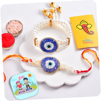 Craftvatika Designer Rakhi Set For Brother And Bhabhi, Premium Evil Eye Rakhi For Bhaiya Bhabhi Set Of 2, Evil Eye Rakhi Bracelet Lumba For Bhabhi With Fridge Magnet Gift For Men Women, Greeting Card, Tilak Set, Magnet For Home Decor