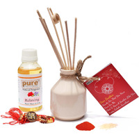 Pure Source India Rakhi Gift Set Of 6 For Brother, Sister, Bhaiya & Bhabhi With One Ceramic Vase, 6 Reed Sticks, 100Ml Relaxing Reed Diffuser Oil, One Card, One Om Rakhi, Roli And Chawal (White Vase)