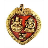 Purpledip Metal Wall Hanging Ganesha-Lakshmi: Auspicious Hindu Symbols On Betel Leaf (11542)
