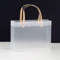 Satyam Kraft 4 Pcs Translucent Gift Bags With Golden Handle | Perfect For Her / Him, Rakhi, Rakshbandhan Gifting ,Return Gifts, Wedding, Anniversary, Birthday, Party Favours, Hampers, Festival (25 X 33 Cm)