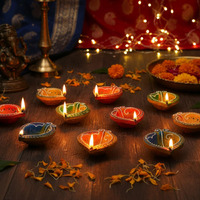 Tied Ribbons Pack Of 12 Large Handmade Clay Diwali Diyas Earthen Oil Lamp Diwali Diya For Diwali Decoration Item Home Puja Office Pooja Room Mandir Temple Table Dipawali (Multi, 7.8 Cm X 2.5 Cm)