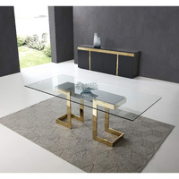 Whiteline Modern Living Sumo Rectangle Dining Table  12Mm Clear Tempered Glass Top  Polished Gold Stainless Steel Base  Matte Black Connector Between The Legs  39"" L X 87"" W X 30"" H