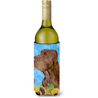 Field Spaniel in Summer Flowers Wine Bottle Beverage Insulator Beverage Insulator Hugger