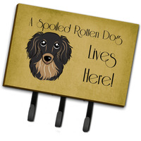 "Caroline's Treasures BB1461TH68 Longhair Black and Tan Dachshund Spoiled Dog Lives Here Leash or Key Holder, Large, Multicolor"