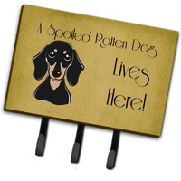 "Caroline's Treasures BB1463TH68 Smooth Black and Tan Dachshund Spoiled Dog Lives Here Leash or Key Holder, Large, Multicolor"