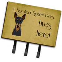 "Caroline's Treasures BB1488TH68 Min Pin Spoiled Dog Lives Here Leash or Key Holder, Large, Multicolor"