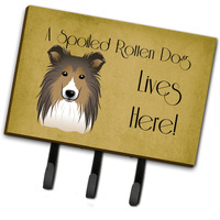 "Caroline's Treasures BB1490TH68 Sheltie Spoiled Dog Lives Here Leash or Key Holder, Large, Multicolor"