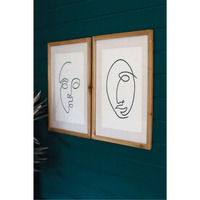 SET OF TWO FACE PRINTS UNDER GLASS