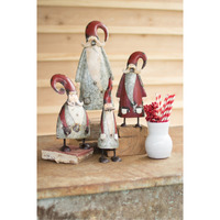 SET OF FOUR GALVANIZED AND PAINTED SANTAS