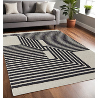 5' X 8' Black and Ivory Abstract Geometric Hand Tufted Area Rug