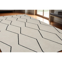 5' X 8' Beige and Black Geometric Power Loom Distressed Area Rug