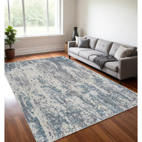 5' X 8' Gray and Ivory Abstract Area Rug