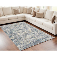 5' X 8' Blue and Ivory Abstract Area Rug