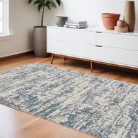 9' X 12' Blue and Ivory Abstract Area Rug