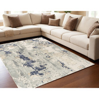 5' X 8' Blue and Beige Abstract Area Rug