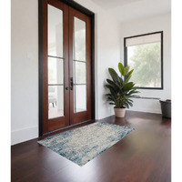 2' X 3' Blue and Ivory Abstract Area Rug
