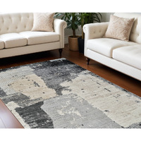 7' X 10' Beige and Black Abstract Distressed Area Rug