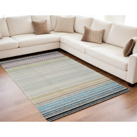 5' X 8' Beige and Blue Abstract Distressed Area Rug