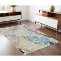 4' X 6' Beige and Blue Abstract Distressed Area Rug