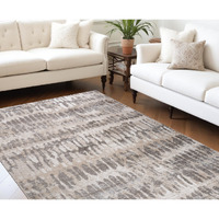 7' X 10' Beige and Brown Abstract Distressed Area Rug