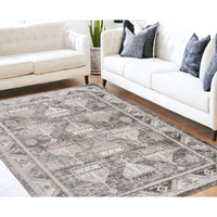 5' X 8' Beige and Brown Abstract Distressed Area Rug