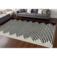 8' X 11' Cream and Black Abstract Distressed Area Rug