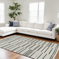 8' X 11' Cream and Black Abstract Distressed Area Rug
