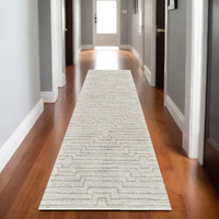 8' Cream and Beige Abstract Distressed Area Rug