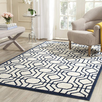 Safavieh Amherst Collection Area Rug - 6' X 9', Ivory & Navy, Geometric Design, Non-Shedding & Easy Care, Ideal For High Traffic Areas In Living Room, Bedroom (Amt416M)