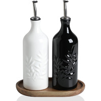 Sweejar Ceramic Olive Oil Dispenser Bottle, 20 Oz Relief Opaque Oil Cruet Protects To Reduce Oxidation, Suitable For Storage Vinegar, Soy Sauce,Liquids,Set Of 2 (White Black)